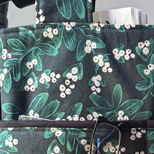 Load image into Gallery viewer, Green Mistletoe Christmas walker bag with pockets and black quilted interior