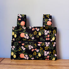Load image into Gallery viewer, Black citrus and flora walker bag with black interior
