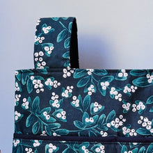 Load image into Gallery viewer, Green Mistletoe Christmas walker bag with pockets and black quilted interior