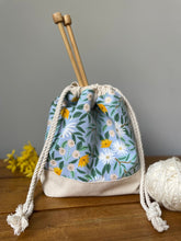 Load image into Gallery viewer, Blue daisy knitting project bag from Rifle Paper co fabrics
