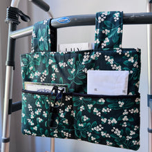 Load image into Gallery viewer, Green Mistletoe Christmas walker bag with pockets and black quilted interior
