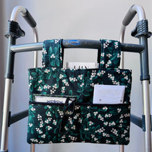 Load image into Gallery viewer, Green Mistletoe Christmas walker bag with pockets and black quilted interior

