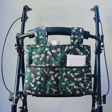 Load image into Gallery viewer, Green Mistletoe Christmas walker bag with pockets and black quilted interior
